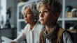 © Anna - grandson teaches elderly woman to use and play on computer ,senior technology adoption.