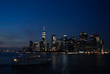 Boat Parties In The Hudson River Next To The New York Skyline At Night