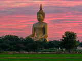 Fototapeta Natura - buddha statue at sunset