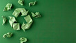 Green recycle symbol on crumbled wrinkled paper. Graphic banner with copyspace