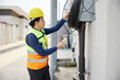 © offsuperphoto - male worker checking electrical control panel in the factory