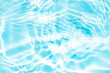 © Water 💧 Shining 📸 - Bluewater waves on the surface ripples blurred. Defocus blurred transparent blue colored clear calm water surface texture with splash and bubbles. Water waves with shining pattern texture background.