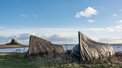 Wall Mural - Stunning dramatic landscape image of Lindisfarne, Holy Island in Northumberland England during Winter