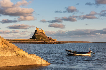 Canvas Print - Stunning dramatic landscape image of Lindisfarne, Holy Island in Northumberland England during Winter