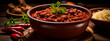 chili beans with meat on a plate. Selective focus.