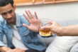 © Pormezz - Stop alcohol concept. Person refuse to drink alcohol.