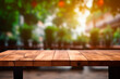 Empty wooden table and blurred greenhouse background   for product display