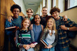 © Drazen - Multiracial group of happy classmates at high school looking at camera.