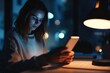 © sania - Smart phone mobile receiving mail message, email notification, Woman employee use mobile phone after receiving an email message while sitting at work desk at night