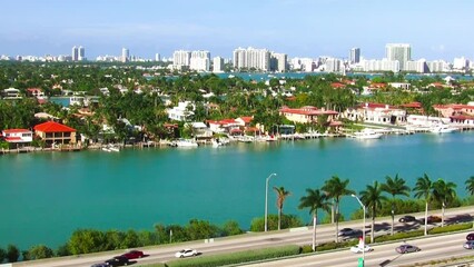 Wall Mural - MacArthur Causeway on a sunny day, aerial view of Miami Beach