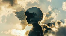 Silhouette  Of Child With Wings In Double Exposure Of Clouds
