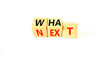 © Dzmitry - What next symbol. Concept words What next on wooden blocks. Changed words what to next. Beautiful white table white background. Business What next concept. Copy space.