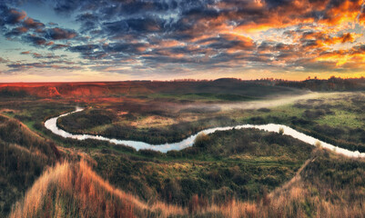 Wall Mural - Autumn morning in the picturesque river valley. Autumn landscape with clouds. Nature of Ukraine
