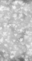 Wall Mural - White glowing heart symbols loop motion on silver bokeh vertical background. Valentine's day holidays copy space greeting card.