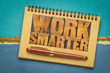 Sticker - work smarter word abstract - motivational advice or reminder - text in letterpress wood type in a sketchbook, business productivity and efficiency concept