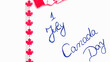 Canada day 1 July handwriting on paper with Canada flag. Writing text on memo post reminder