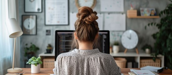 female entrepreneur working from home at a desk.
