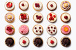 © Liliya Trott - Top view of the assortment of many different cupcakes with colorful frosting and berries on white table background. Bakery concept