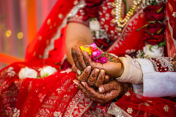 Indian couple's holding hands close up