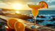 The refreshing orange margarita with salt on the edge of the glass, against the backdrop of the wa