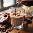 A glass of milk with chocolate being poured out ,Chocolate day, Valentines Day, Valentines week 