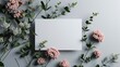 Mockup square white blank card sheet of paper with pink flowers branch Background. Top view 3D flat greeting card Valentine mockup