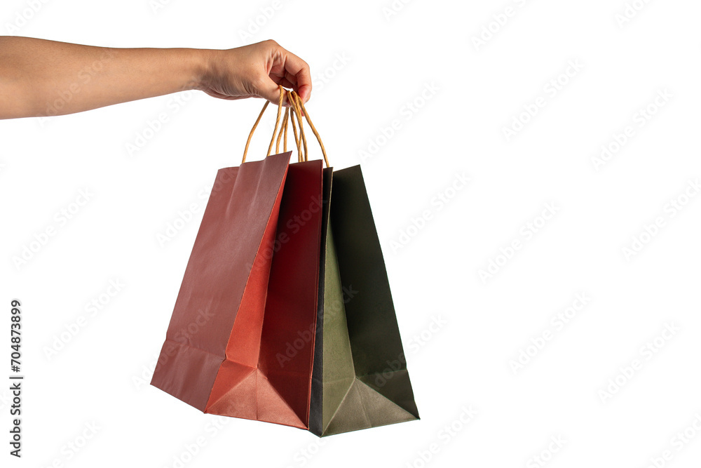 Red and green paper shopping bag in hand on transparent background ...