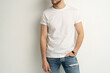 © opolja - Shirt design and people concept - close up of young man in blank white t-shirt front view isolated