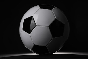 Canvas Print - One soccer ball in darkness. Sports equipment