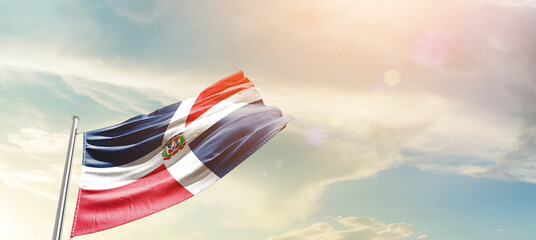 Wall Mural - Dominican national flag cloth fabric waving on the sky - Image