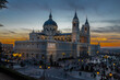 Madrid, Spain 28-12-2022 The Almudena Cathedral during a colorful sunset, it is the most important and Catholic religious building in Madrid and a visit is free of charge except for the crypt 