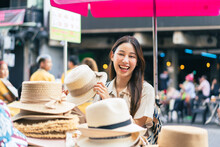 Young Asian Woman Traveler Tourist Walking At Outdoor Market In Bangkok In Thailand. People Traveling, Summer Vacation And Tourism