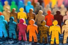 Colorful Wooden Figurines Of Human Figures Symbolizing DEIB Values