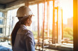 © Luba - Blueprint Scrutiny: Woman on Construction Grounds