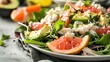 Fresh salad featuring lump crab meat, avocado, grapefruit, and mixed greens, tossed in a lemon vinaigrette.