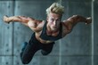 Athletic blonde man in a dynamic pose
