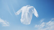 Perfectly white clothes, White shirt with ghost model floating in blue background. Snow-white shirt flies in the sky against the clouds. Perfectly white clothes after washing, without human body. Ai
