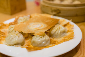 Canvas Print - Pan fry with steamed pork meat bun