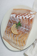 Wall Mural - Raw pollock (Pollachius virens) fillet. Fresh fish for healthy food lifestyle. Spices and herbs