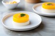 mango dessert served on white plate minimal food set design at fancy fusion restaurant 