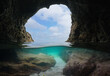 View from a sea cave on the Atlantic coast of Spain, split level view over and under water surface, natural scene, Galicia, Rias Baixas