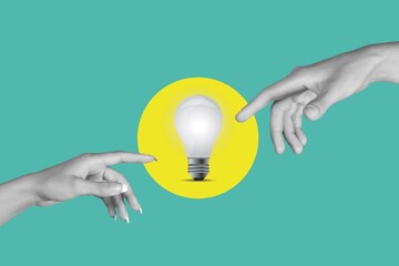 Wall Mural - human hand reaching to light bulb