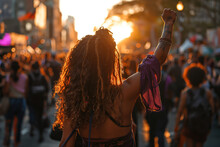 Generative AI back view image of an unrecognizable Black woman with curly hair and dreadlocks, raising her fist at a feminist protest at dusk