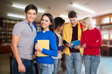 Young happy student at university classroom