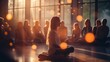 Meditation group in a yoga studio with sunlight