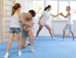 © JackF - Father teaches his little daughter to use forceful techniques and grips during self-defense classes
