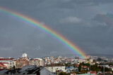 Fototapeta Tęcza - The rainbow is a phenomenon that occurs when it is sunny and sunny due to the refraction of light.