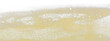 © Jade - Explosion metallic gold glitter sparkle. Golden Glitter powder spark blink celebrate, blur foil explode in air, fly throw gold glitters particle. Black background isolated, selective focus Blur bokeh