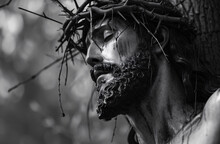 Statue Of Jesus Christ With Crown Of Thorns On The Cross