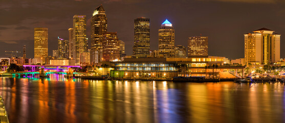 Wall Mural - Tampa at Night - A closeup view of waterfront skyscrapers at Tampa Downtown on a calm Summer night. Florida, USA.